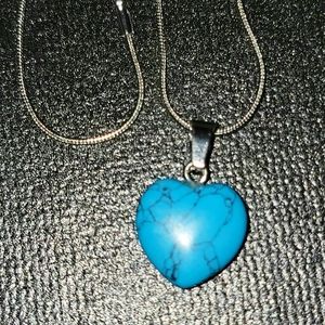 Turquoise heart chakra on silver plated chain